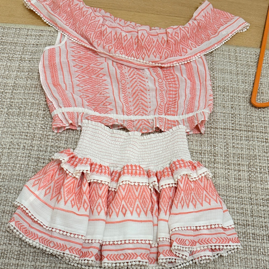 Pink And White Patterned Two-Piece Outfit